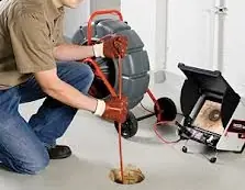 Sewer camera video inspection through a clean out