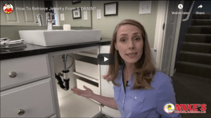 How to retrieve something from drain, video still